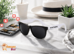 Custom promotional sunglasses with logo imprint styled next to a phone displaying Instagram likes and photos